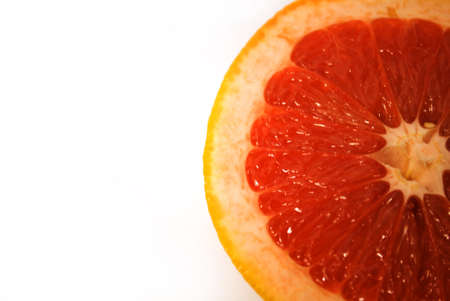 half of grapefruit at the white background