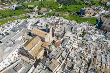 Beautiful town of Ostuni the white city, and his cathedral, in Apulia (Puglia), Italyの写真素材