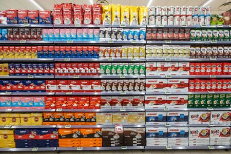 Rome / Italy. December 05, 2018: Shelving with products of different nature, variety of food displayed on the shelves inside a MA supermarket in Rome in Italy. Coffee packs.の写真素材