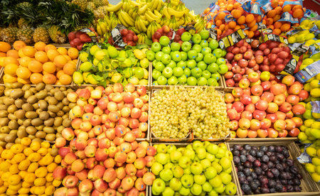 Rome, Italy. December 05, 2018: Fruit and vegetable department with numerous varieties of fruit exposed inside a MA supermarket in Italy in Rome. Crates of fruit and vegetables in a large space.のeditorial素材