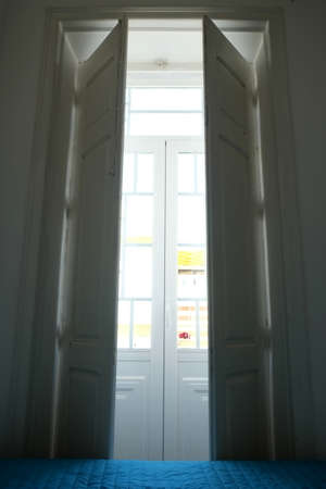 Bedroom window opened in the morningの写真素材