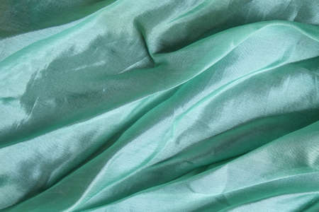 Smooth and shiny aqua blue silk handkerchiefの写真素材