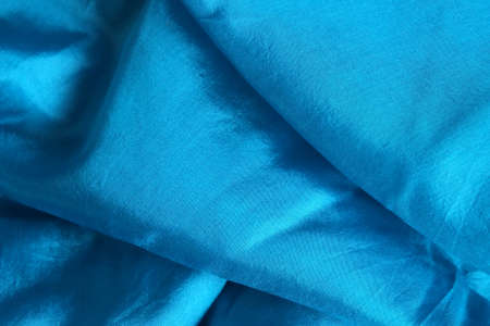Smooth and shiny blue silk handkerchiefの写真素材