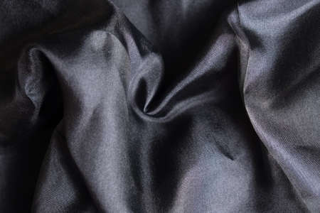 Smooth and shiny black silk handkerchiefの写真素材