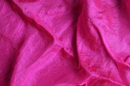 Smooth and shiny fuchsia pink silk handkerchiefの写真素材