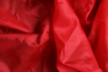 Smooth and shiny vivid red silk handkerchiefの写真素材