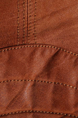 Detail picture of nylon seam in a brown leather jacketの写真素材