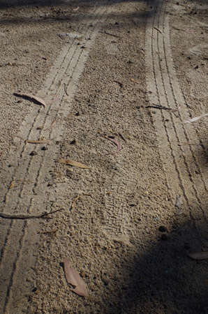Tire marks on unpaved road. Adventure and motorsportsの写真素材