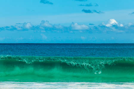 wave on the beach in Mahe Island, Seychellesの写真素材