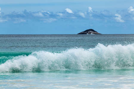 wave on the beach in Mahe Island, Seychellesの写真素材