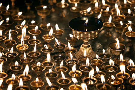 Burning candles in Buddhist temple, Ulan baator Mongolia