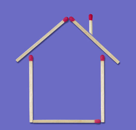 House of matches with chimneyの写真素材
