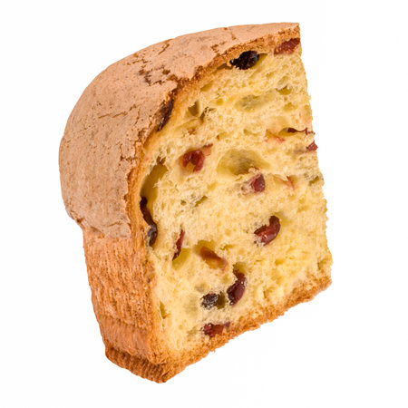 Cake with raisins and dried cranberries isolated on white backgroundの写真素材