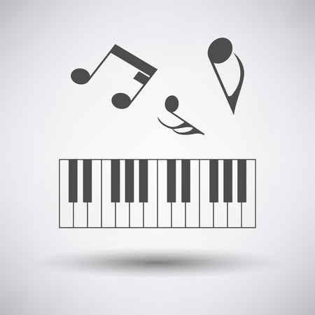 Piano keyboard icon on gray background with round shadow.のイラスト素材