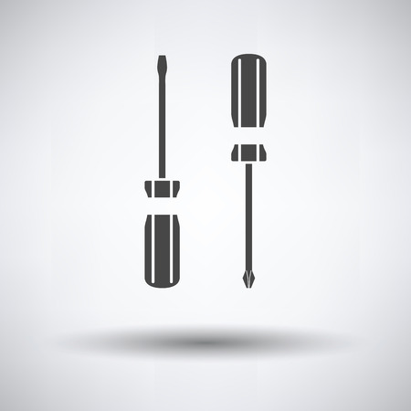 Screwdriver icon on gray background, round shadow. Vector illustration.のイラスト素材