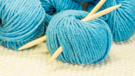 Wollknaeuel in turquoise with needlesの写真素材