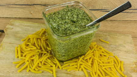 Fresh Pesto with basil and olive oil with noodlesの写真素材