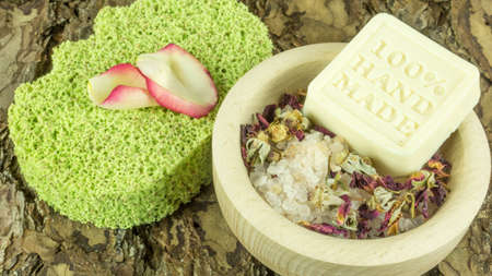 Handmade soap with rose petals and flowers and other accessoriesの写真素材