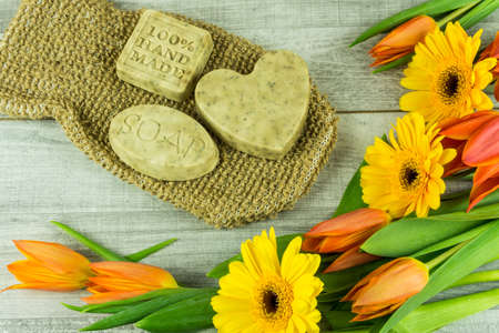 Handmade lavender soap with tulips and other accessoriesの写真素材
