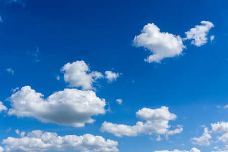 Blue sky with white clouds at sunshineの写真素材