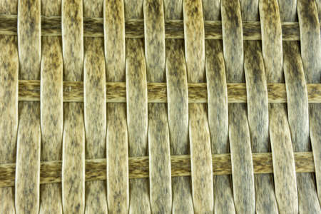Braided rattan in brown as a backgroundの写真素材