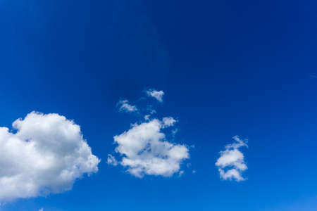 Blue sky with big white cloudsの写真素材