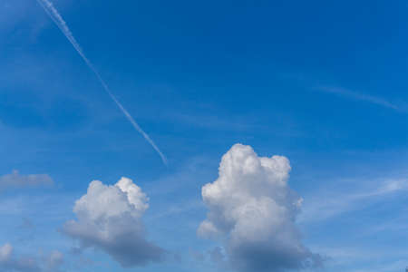 Blue sky with abstract clouds at sunshineの写真素材