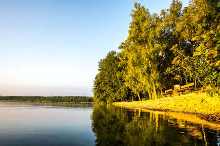 Resting place at a lake at sunrise