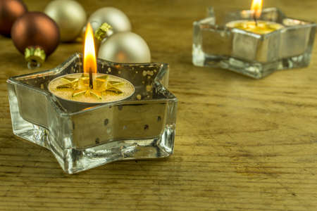 Christmas decoration with christmas balls and candlesの写真素材
