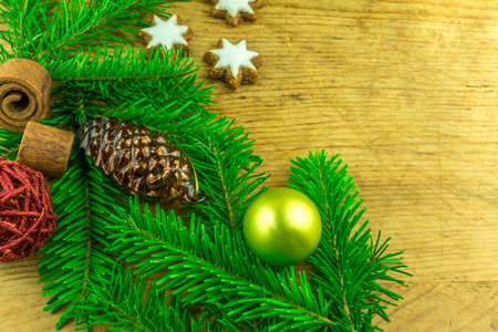 Christmas decoration with stars, Christmas balls and branches of a fir treeの写真素材