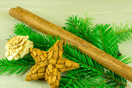 Christmas decoration with cinnamon starrn and tannenzweigの写真素材