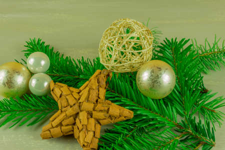 Christmas decoration with cinnamon stars, Christmas balls and pine branchの写真素材
