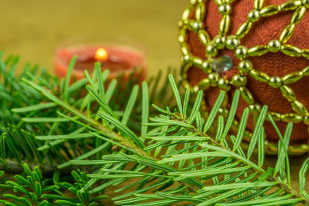 Christmas decoration - tannenzweige with red candlesの写真素材