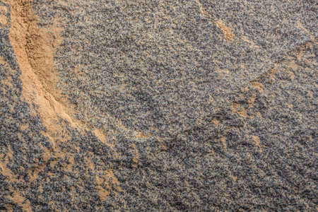 Lava rock in different colors as a backgroundの写真素材