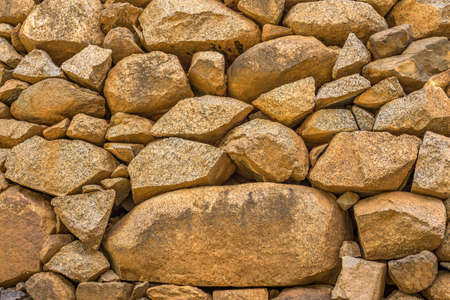 Lava rock in different colors as a backgroundの写真素材