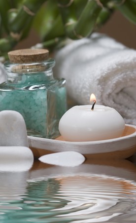 Spa background with bath salts and a candle.の写真素材