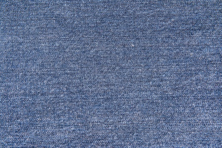 Old and worn blue jeans pattern background in a king size
の写真素材