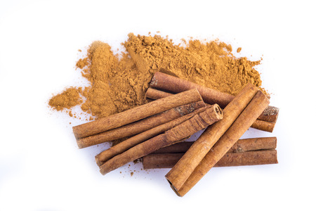 Cinnamon sticks and powder isolated on a white background