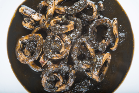 Squids in its own ink a typical recipe from mediterranean italian and spanish cuisine