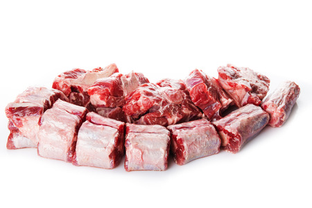 Raw oxtail cut isolated on a white backgroundの写真素材