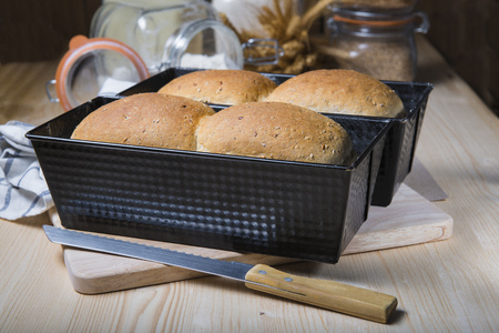 Homemade sourdough bread with seeds on the bakery table