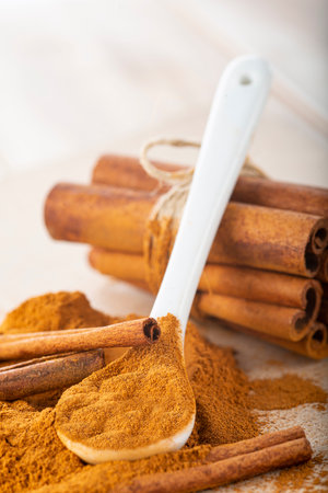 cinnamon sticks and ground powder with a copy spaceの写真素材