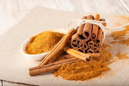 cinnamon sticks and ground powder with a copy spaceの写真素材