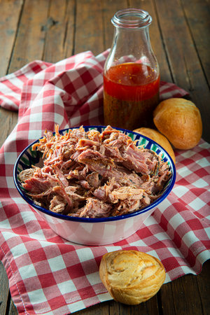 Pulled pork with vinegar barbecue sauce american style