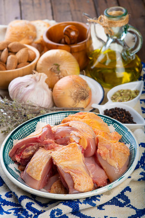 Raw ingredients to cook chicken in pepitoria sauceの写真素材