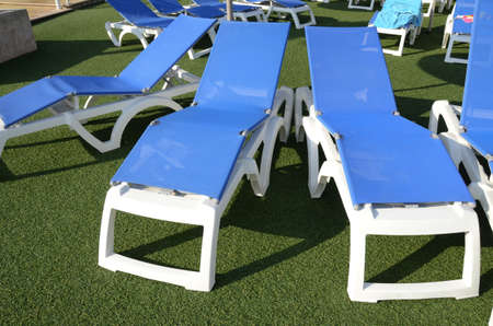chairs at poolside