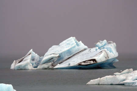 Blue ice floating in the Jokulsarlon lake in the south of Iceland.