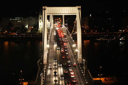 Traffic on Elisabeth bridge at night (Budapest, Hungary).の写真素材