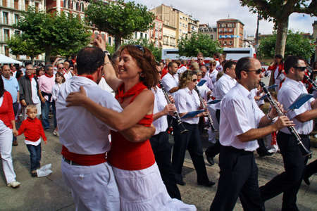 Pamplona / Spain; 07/10/2012. The festival of San Ferm?n is a week-long celebration held annually in the city of Pamplona. People celebrate this festival traditionally with red and white clothes.のeditorial素材