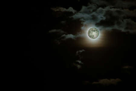 Moon and clouds night background, Halloween night.の写真素材